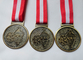 Προσαρμοσμένο παλαιό μετάλλιο μαραθωνίου επένδυσης HC Andersen κραμάτων ορείχαλκου/χαλκού/ψευδάργυρου με τη ρίψη κύβων